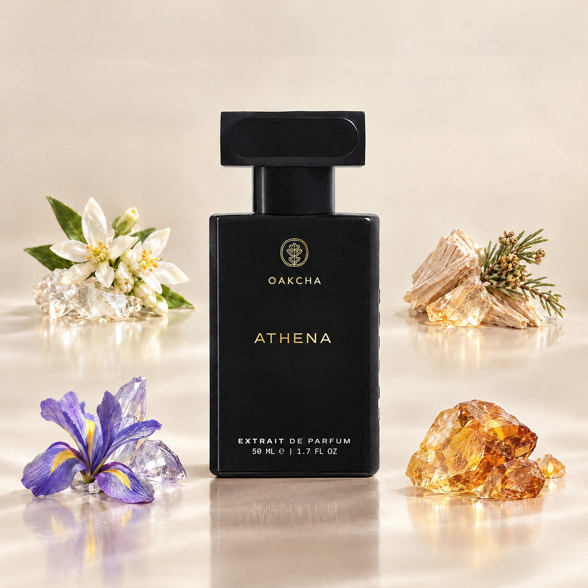 Front view of Athena 50 ml perfume bottle with black rectangular design beside lemon blossom, amyris, iris and amber notes
