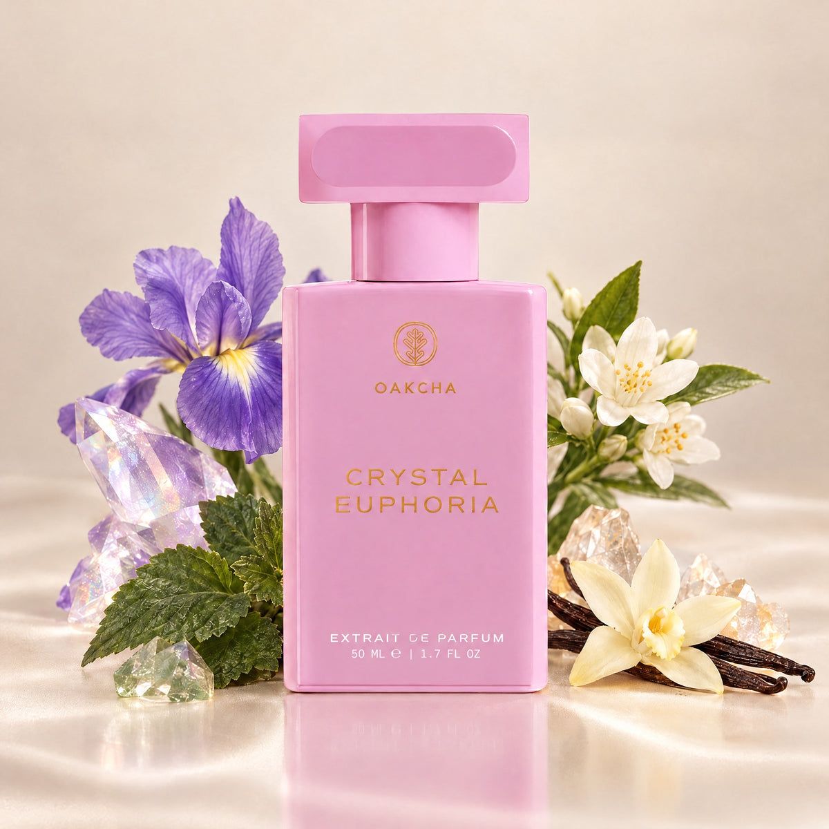 Front view of pink Crystal Euphoria Extrait de Parfum bottle, 50 mL, with iris, orange blossom, patchouli, and vanilla notes