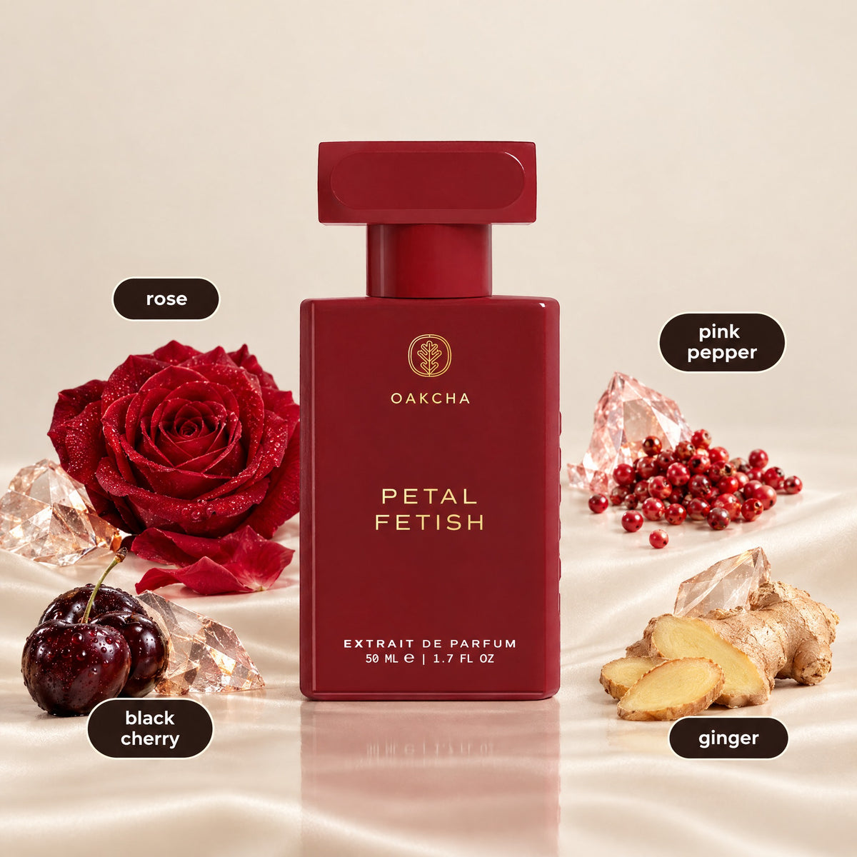 Front view of Petal Fetish 50 mL Extrait de Parfum bottle showcasing rose, pink pepper, black cherry, and ginger notes on satin
