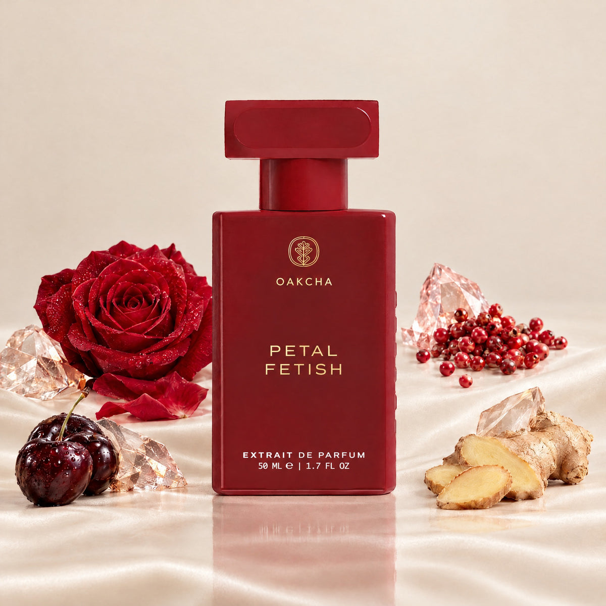 Front view of Petal Fetish 50 mL Extrait de Parfum bottle showcasing rose, pink pepper, black cherry, and ginger notes on satin