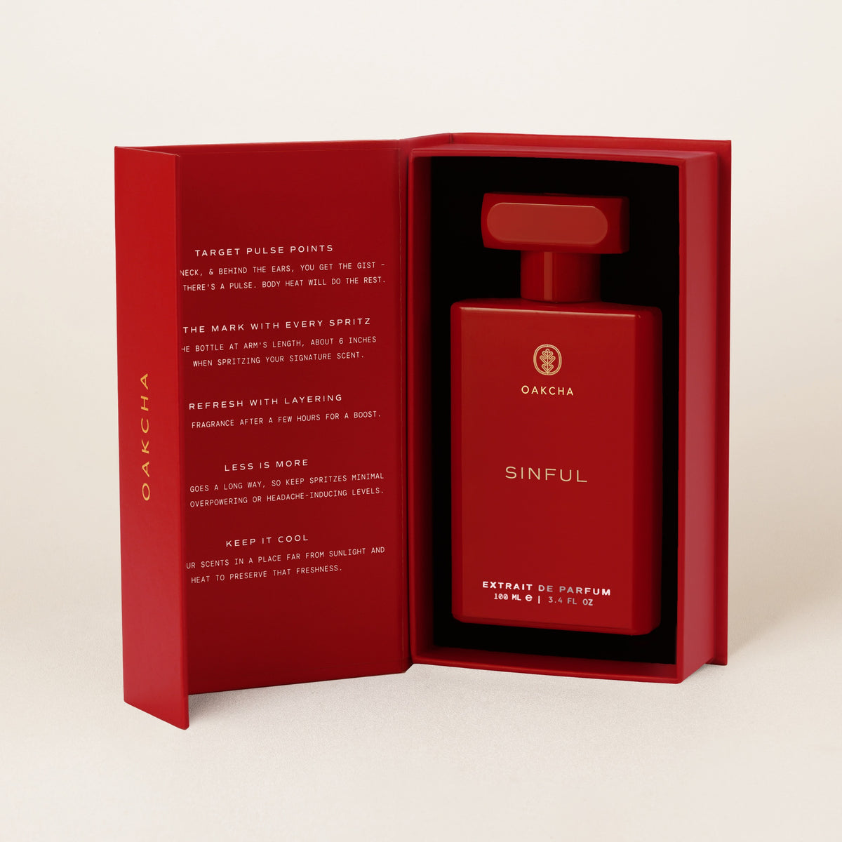 Sinful Extrait de Parfum bottle in its open gift box